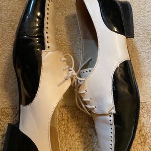 Women’s tan and black Bally dress shoes